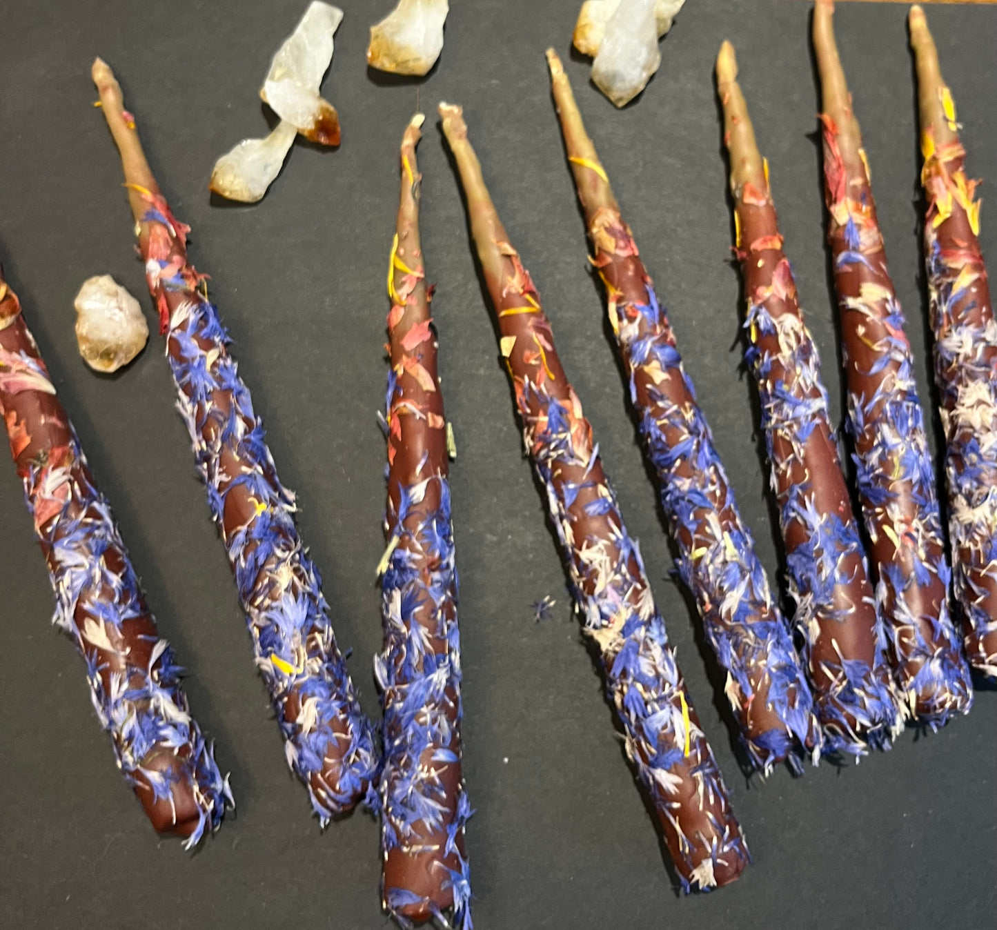 Ritual candles with petals